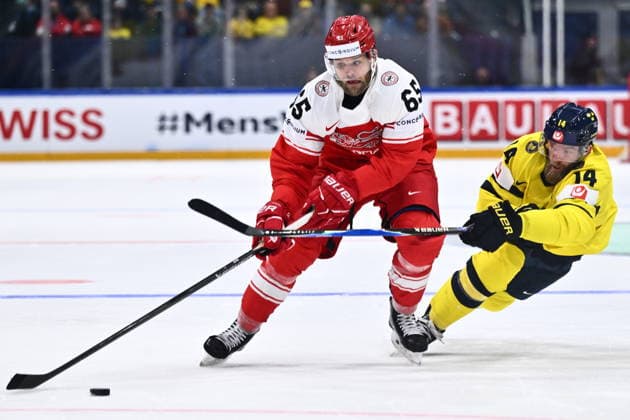 L-R Christian Wejse (DEN) and Mattias Ekholm (SWE) in action during the 2026 IIHF World Championship, WM, Weltmeisterschaft Group B, Denmark vs Sweden, on May 17, 2026, Fribourg, Switzerland. (CTKxPhoto RadekxPetrasek) CTKPhotoP2026051704965  CTKPhotoP2026051704965