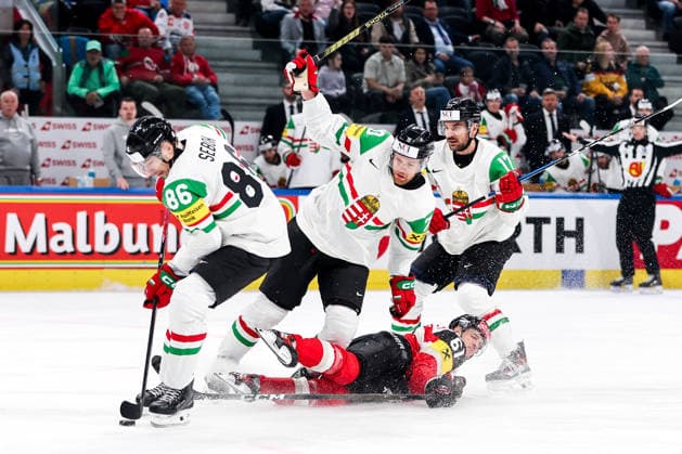 Ice hockey, Eishockey - IIHF WC 2026 ZURICH,SWITZERLAND,17.MAY.26 - ICE HOCKEY - IIHF Ice Hockey World Championship, WM, Weltmeisterschaft 2026, group stage, Austria vs Hungary. Image shows Balazs Sebok (HUN), Zsombor Garat (HUN), Simeon Schwinger (AUT) and Roland Kiss (HUN).  GEPAxpictures xMaticxKlansek