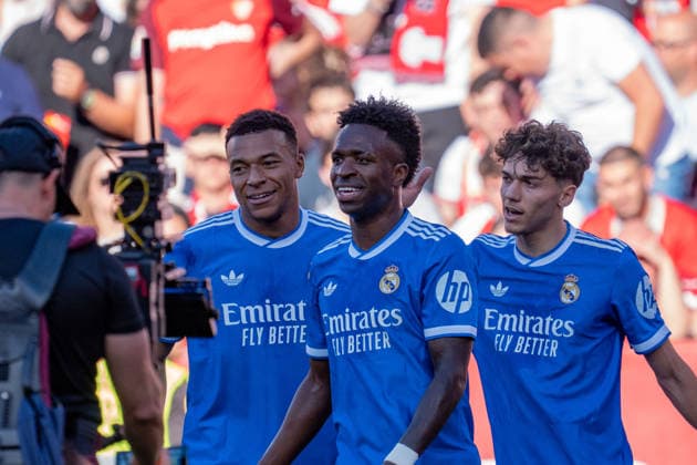 Vinicius Junior (N7), Kylian Mbappe (N10) & Thiago Pitarch Pinar (N45) celebrate Real Madrid first goal during the La Liga EA Sports match between Sevilla FC and Real Madrid at Estadio Ramon Sanchez Pizjuan on May 17th 2026, in Sevilla, Spain Copyright: xAndresxLopezxSheridanxx xSPPx Sportspressphoto_SPR148860
