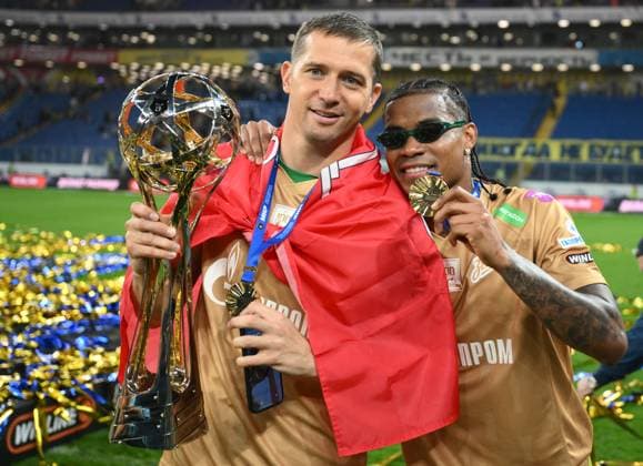 Russia Soccer Premier-League Rostov - Zenit 9167686 17.05.2026 Zenit s goalkeeper Mikhail Kerzhakov and Zenit s Wilmar Barrios pose with the thophy to celebrate their team s 2025 2026 Russian Premier-League championship after winning the soccer match against Rostov Rostov-on-Don, in Rostov-on-Don, Russia. Vladimir Astapkovich Sputnik Rostov-on-Don Russia  Copyright: xVladimirxAstapkovichx