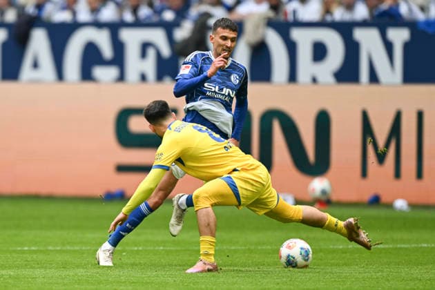 from left in duel Dejan Ljubicic Schalke 21 Mehmet Can Aydin Braunschweig 8 17 05 2026 ¢ Football ¢ FC Schalke 04 vs Eintracht Braunschweig, Veltins Arena, Gelsenkirchen, DFB DFL REGULATIONS PROHIBIT ANY USE OF PHOTOGRAPHS AS IMAGE SEQUENCES AND OR QUASI VIDEO Copyright: xpepphotox xSaschaxWeizx pep00321, pep_20260517_hm_359776