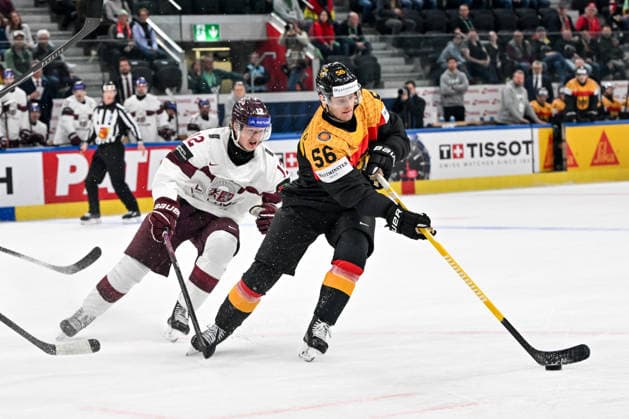 ZURICH, SWITZERLAND MAY 17 Manuel Wiederer of Germany protects the puck from Glebs Prohorenkovs of Latvia during the 2026 IIHF Ice Hockey World Championship Switzerland game between Germany and Latvia at Swiss Life Arena on May 17, 2026 in Zurich, Zurich Zurich Swiss Life Arena Zurich Switzerland Switzerland Copyright: xJustPictures.ch AndreaxBrancax jp-en-EuSpIm-JP7_ANB_Ger_Lat_17052026_6968