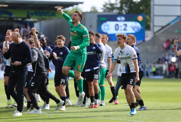 16 05 2026, Soccer 2 Bundesliga, SV Darmstadt 98 SC Paderborn, v l , Paderborn players cheering jubilantly celebrate after the final whistle in Hanover, Paderborn plays in the relegation for promotion to the Bundesliga, goalkeeper Dennis Seimen SC Paderborn , Ruben Müller SC Paderborn DFL DFB REGULATIONS PROHIBIT ANY USE OF PHOTOGRAPHS AS IMAGE SEQUENCES AND OR QUASI VIDEO xdcx Copyright: HMBxMedia Claus