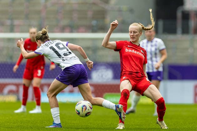 Beke Sterner SGS Essen and Meret Felde Sport Club Freiburg battle for the ball during the Women s Soccer Bundesliga match between SGS Essen and Sport Club Freiburg, Stadion an der Hafenstrasse on May 17, 2026 in Essen, Germany, Germany Photo by Mario Hommes DeFodi Images Beke Sterner SGS Essen and Meret Felde Sport Club Freiburg battle for the ball during the Women s Soccer Bundesliga match between SGS Essen and Sport Club Freiburg at Stadion an der Hafenstrasse on May 17, 2026 in Essen, Germany Photo by Mario Hommes DeFodi Images DFL regulations prohibit any use of photographs as image sequences and or quasi video