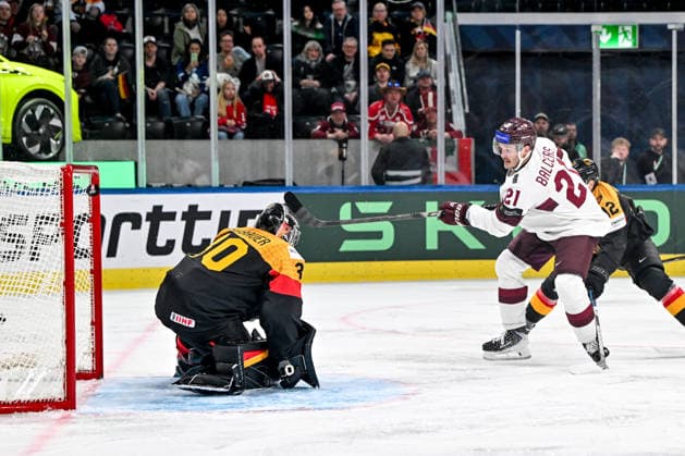 ZURICH, SWITZERLAND MAY 17 Rudolfs Balcers of Latvia scores a goal against goalkeeper Philipp Grubauer of Germany during the 2026 IIHF Ice Hockey World Championship Switzerland game between Germany and Latvia at Swiss Life Arena on May 17, 2026 in Zurich, Zurich Zurich Swiss Life Arena Zurich Switzerland Switzerland Copyright: xJustPictures.ch AndreaxBrancax jp-en-EuSpIm-JP7_ANB_Ger_Lat_17052026_7538