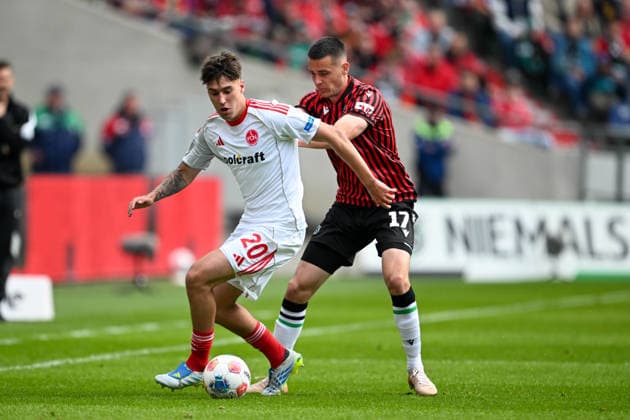 2 Bundesliga Hannover 96 1 FC Nürnberg on 17 05 2026 at the HDI Arena in Hannover Bastian Allgeier Hannover in a duel against Javier Fernandez Nuernberg MT