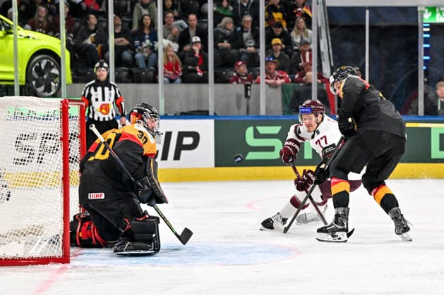 ZURICH, SWITZERLAND MAY 17 Kristaps Zile of Latvia tries to score against goalkeeper Philipp Grubauer of Germany L during the 2026 IIHF Ice Hockey World Championship Switzerland game between Germany and Latvia at Swiss Life Arena on May 17, 2026 in Zurich, Zurich Zurich Swiss Life Arena Zurich Switzerland Copyright: xJustPictures.ch AndreaxBrancax jp-en-EuSpIm-JP7_ANB_Ger_Lat_17052026_7641