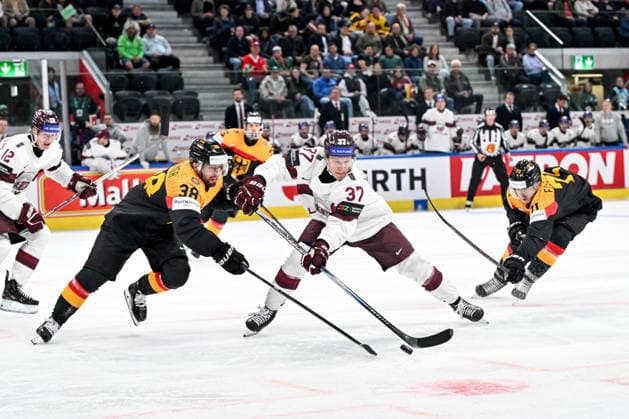 ZURICH, SWITZERLAND MAY 17 Oskars Lapinskis of Latvia and Fabio Wagner of Germany L in a battle for the puck during the 2026 IIHF Ice Hockey World Championship Switzerland game between Germany and Latvia at Swiss Life Arena on May 17, 2026 in Zurich, Zurich Zurich Swiss Life Arena Zurich Switzerland Copyright: xJustPictures.ch AndreaxBrancax jp-en-EuSpIm-JP7_ANB_Ger_Lat_17052026_7680