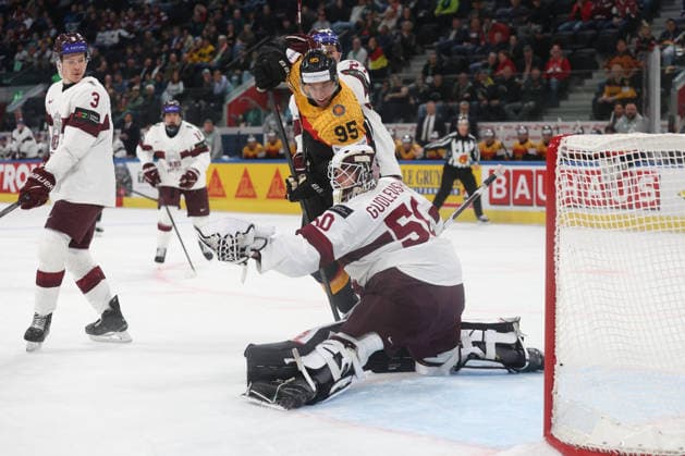 17 05 2026 Swiss Life Arena Zuerich , SWITZERLAND, Men IIHF World Championship Zurich 2026 Group A Germany Latvia Frederik Tiffels GER ahead of goalkeeper Kristers Gudlevskis LAT