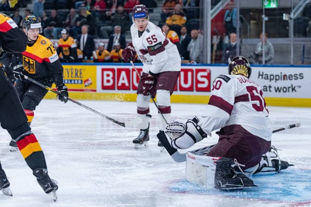 ZURICH, SWITZERLAND - MAY 17: -73ger- trying to score against Kristers Gudlevskis (Latvia, 50) during the Preliminary Round - Group A Match 15 between Germany and Latvia at the IIHF Ice hockey, Eishockey World Championship, WM, Weltmeisterschaft 2026, Swiss Life Arena on May 17, 2026 in Zurich, Switzerland. Zurich Switzerland Copyright: xTimoxSteinx