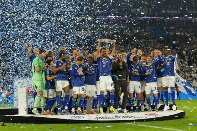 Gelsenkirchen, Germany, 17 05 26, Kenan Karaman FC Schalke 04 cheers with the championship trophy and his team during the Bundesliga 2 match between FC Schalke 04 Eintracht Braunschweig at the Veltins Arena in Gelsenkirchen Photo by Joachim Bywaletz DFB DFL REGULATIONS PROHIBIT ANY USE OF PHOTOGRAPHS AS IMAGE SEQUENCES AND OR QUASI VIDEO Copyright: JoachimxBywaletz xJB-Sportfoto