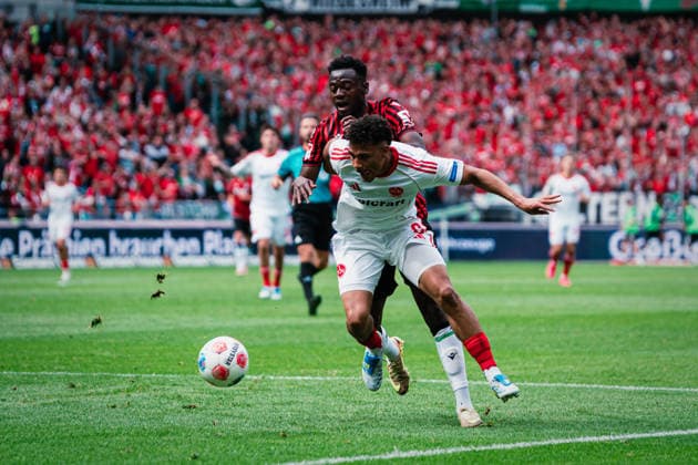2 Bundesliga Hannover 96 vs 1 FC Nürnberg, 17 05 2026 Mustapha Bundu Hannover 96, 7 in duel with Henri Koudossou 1 FC Nürnberg, 8 Football, 2 Bundesliga, Matchday 34 Hannover 96 vs 1 FC Nürnberg on 17 05 2026 at Heinz von Heiden Arena, Hannover DFL REGULATIONS PROHIBIT ANY USE OF PHOTOGRAPHS AS IMAGE SEQUENCES AND OR QUASI VIDEO Copyright: xBEAUTIFULxSPORTS Tonhäuserx