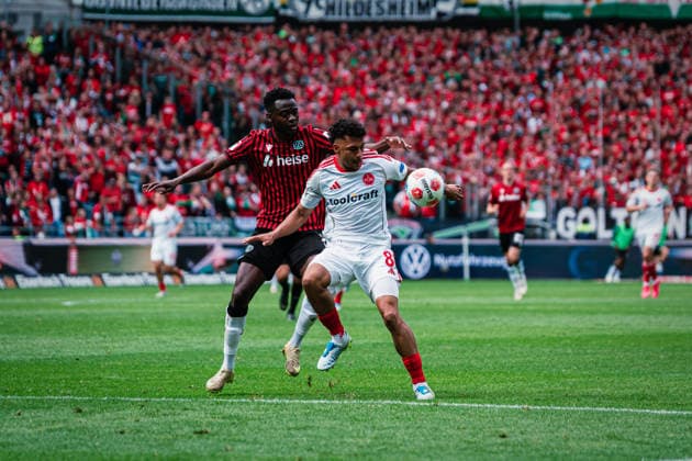 2 Bundesliga Hannover 96 vs 1 FC Nürnberg, 17 05 2026 Mustapha Bundu Hannover 96, 7 in duel with Henri Koudossou 1 FC Nürnberg, 8 Football, 2 Bundesliga, Matchday 34 Hannover 96 vs 1 FC Nürnberg on 17 05 2026 at Heinz von Heiden Arena, Hannover DFL REGULATIONS PROHIBIT ANY USE OF PHOTOGRAPHS AS IMAGE SEQUENCES AND OR QUASI VIDEO Copyright: xBEAUTIFULxSPORTS Tonhäuserx