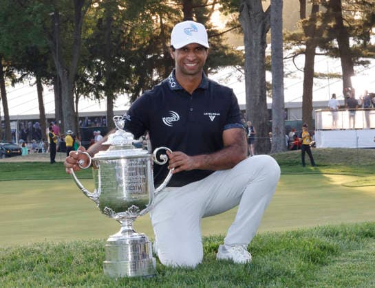 Aaron Rai of England poses with the Wanamaker Trophy after winning the 2026 PGA, Golf Herren Championship at Aronimink Golf Club in Newtown Square, Pennsylvania, on Sunday, May 17, 2026. Rai won with an 9-under-par score of 271.  PHI20260517913 LAURENCExKESTERSON