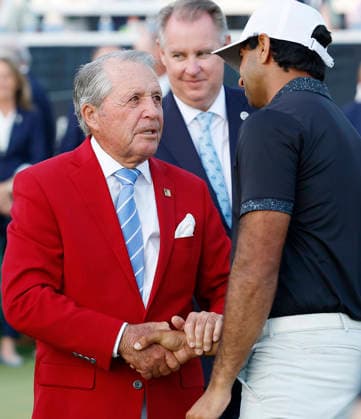 Aaron Rai of England shakes hands with golfing legend Gary Player (L) after winning the 2026 PGA, Golf Herren Championship at Aronimink Golf Club in Newtown Square, Pennsylvania, on Sunday, May 17, 2026. Rai won with an 9-under-par score of 271.  PHI20260517914 LAURENCExKESTERSON