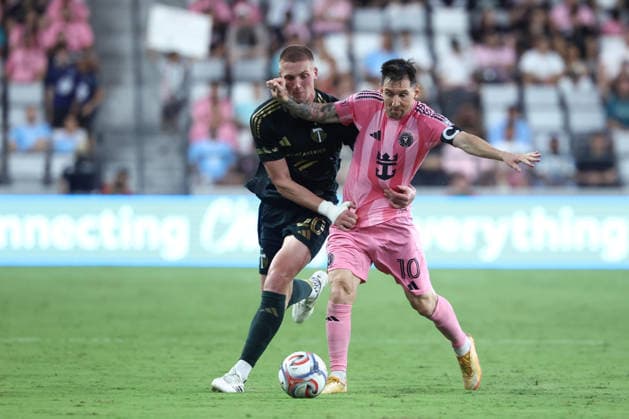 MIAMI, FL - MAY 17: Inter Miami CF midfielder Leo Messi (10) is stopped by a hold by Portland Timbers defender Finn Surman (20) in the second half during the match between the Portland Timbers and Inter Miami CF on Sunday, May 17, 2026 at Nu Stadium in Miami, FL. (Photo by Peter Joneleit Icon Sportswire) SOCCER: MAY 17 MLS, Fussball Herren, USA Inter Miami CF vs Portland Timbers EDITORIAL USE ONLY Icon2605017073