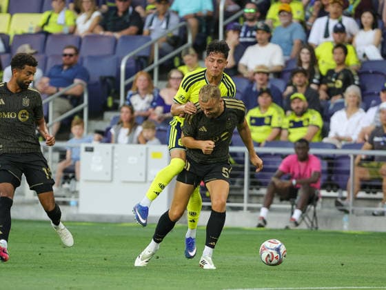 May 17, 2026: Nashville SC forward Warren Madrigal (41) runs into LAFC defender Ryan Porteous (5) during a MLS, Fussball Herren, USA match between LAFC and Nashville SC at Geodis Park in Nashville, TN. CSM MLS 2026: LAFC Vs Nashville SC MAY 17  - ZUMAc04_ 20260517_zma_c04_006 Copyright: xStephenxFurstx