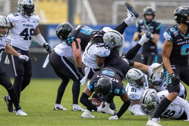 Malik Stanley (Munich Ravens, 03) is tackled by Jaron Wilson (Raiders Tirol, 21) Munich Ravens vs Raiders Tirol, American Football, European Football Alliance (EFA), Week 1, 2026, 17.05.2026, Munich Grünwalder Stadion Munich Germany Copyright: xFootxBowl BjörnxKeckerx