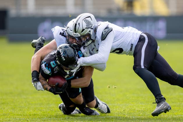 Justus Seelig (Munich Ravens, 05) get tackled by Marco Schneider (Raiders Tirol, 04) Munich Ravens vs Raiders Tirol, American Football, European Football Alliance (EFA), Week 1, 2026, 17.05.2026, Munich Grünwalder Stadion Munich Germany Copyright: xFootxBowl BjörnxKeckerx