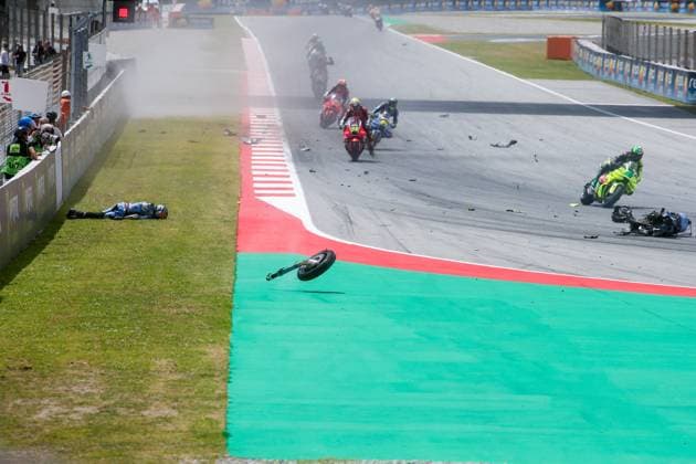 (260518) -- BARCELONA, May 18, 2026 -- BK8 Gresini Racing s Alex Marquez (L) of Spain crashes during the MotoGP Grand Prix of Catalunya in Montmelo, Spain, May 17, 2026. (Photo by Xinhua) (SP)SPAIN-CATALUNYA-MOTOGP-GRAND PRIX ChristianxBourget 