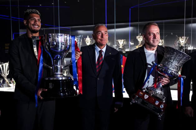 May 18, 2026, Barcelona, Barcelona, SPAIN: Ronald Araujo, Hansi Flick and Rafa Yuste, President of FC Barcelona, Barca during ceremony to present the championship trophies won by FC Barcelona in LaLiga EA Sports and the Spanish Super Cup, held at the club s museum on May 18, 2026 in Barcelona, Spain. Barcelona SPAIN - ZUMAa181 20260518_zaa_a181_004 Copyright: xJavierxBorregox
