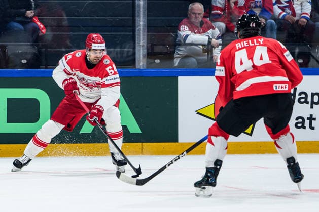 260518 Felix Scheel of Denmark and Morgan Rielly of Canada during the 2026 IIHF Ice Hockey World Championship match between Canada and Denmark on May 18, 2026 in Fribourg Photo Jesper Zerman BILDBYRAN kod JZ JZ0718 ishockey ice hockey ishockey vm 2026 vm 2026 iihf world championship kanada canada danmark denmark canada kanada bbeng danmark denmark  Copyright: JESPERxZERMAN BB260518JZ079