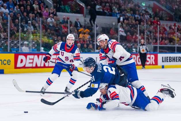 ZURICH, SWITZERLAND - MAY 18: Crash of Ryan Leonard (United States, 9), Patrik Puistola (Finland, 21) and Justin Faulk (United States, 72) during the Preliminary Round - Group A Match 17 between Finland and United States at the IIHF Ice hockey, Eishockey World Championship, WM, Weltmeisterschaft 2026, Swiss Life Arena on May 18, 2026 in Zurich, Switzerland. Zurich Switzerland Copyright: xTimoxSteinx