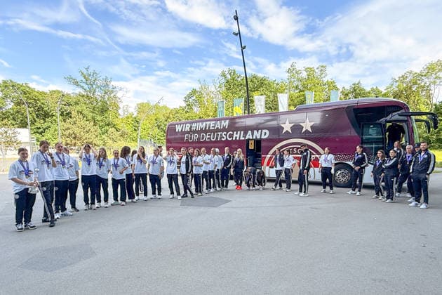 U17 national team with the trophy on the team bus in Frankfurt in front of the DFB Campus Frankfurt 18 05 2026 Reception for the U17 European champions at the DFB Campus