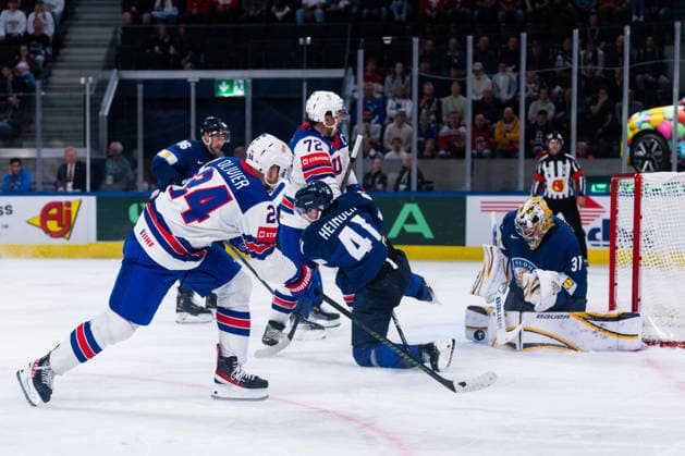 ZURICH, SWITZERLAND - MAY 18: Oliver Mathieu (United States, 24) shooting at the goal of Justus Annunen (Finland, 31) during the Preliminary Round - Group A Match 17 between Finland and United States at the IIHF Ice hockey, Eishockey World Championship, WM, Weltmeisterschaft 2026, Swiss Life Arena on May 18, 2026 in Zurich, Switzerland. Zurich Switzerland Copyright: xTimoxSteinx