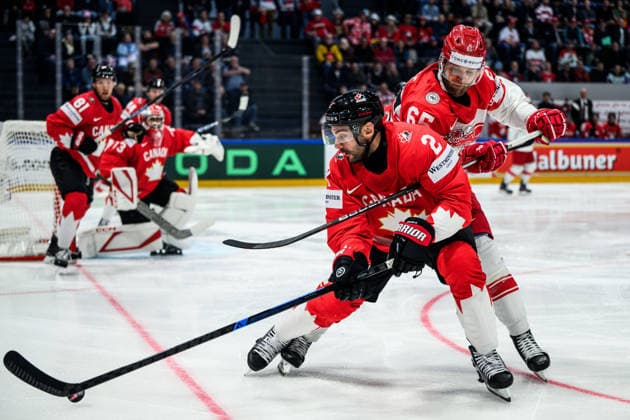 260518 Dylan Demelo of Canada and Christian Wejse of Denmark during the 2026 IIHF Ice Hockey World Championship match between Canada and Denmark on May 18, 2026 in Fribourg Photo Jesper Zerman BILDBYRAN kod JZ JZ0718 ishockey ice hockey ishockey vm 2026 vm 2026 iihf world championship kanada canada danmark denmark canada kanada bbeng danmark denmark  Copyright: JESPERxZERMAN BB260518JZ092