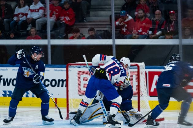 ZURICH, SWITZERLAND - MAY 18: Sam Lafferty (United States, 18) against Justus Annunen (Finland, 31) during the Preliminary Round - Group A Match 17 between Finland and United States at the IIHF Ice hockey, Eishockey World Championship, WM, Weltmeisterschaft 2026, Swiss Life Arena on May 18, 2026 in Zurich, Switzerland. Zurich Switzerland Copyright: xTimoxSteinx