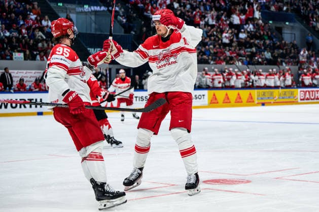 260518 Nick Olesen and Malte Setkov of Denmark celebrates after 3 1 during the 2026 IIHF Ice Hockey World Championship match between Canada and Denmark on May 18, 2026 in Fribourg Photo Jesper Zerman BILDBYRAN kod JZ JZ0718 ishockey ice hockey ishockey vm 2026 vm 2026 iihf world championship kanada canada danmark denmark canada kanada bbeng jubel danmark denmark celebrates  Copyright: JESPERxZERMAN BB260518JZ095