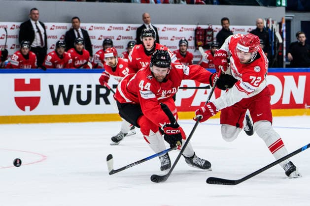 260518 Morgan Rielly of Canada and Phillip Schultz of Denmark during the 2026 IIHF Ice Hockey World Championship match between Canada and Denmark on May 18, 2026 in Fribourg Photo Jesper Zerman BILDBYRAN kod JZ JZ0718 ishockey ice hockey ishockey vm 2026 vm 2026 iihf world championship kanada canada danmark denmark canada kanada bbeng danmark denmark  Copyright: JESPERxZERMAN BB260518JZ098