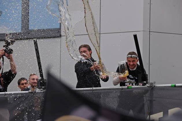 18 05 2026, Football, Men, 2 Bundesliga, Season 2025 2026, SV 07 Elversberg promotion celebration The SV 07 Elversberg team celebrates promotion to the Bundesliga on a makeshift balcony in front of the town hall in Spiesen Elversberg, Carlo Sickinger SV 07 Elversberg and Lukas Petkov SV 07 Elversberg pour beer into the crowd of fans Spiesen Elversberg Rathaus Saarland Germany DEU Copyright: xFabianxKleerx