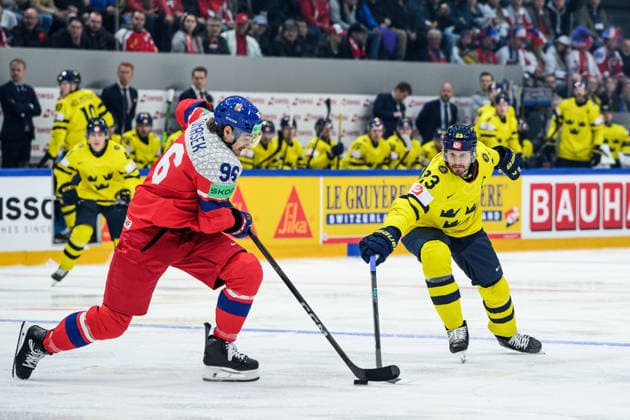 260518 David Tomasek of Czech Republic and Oliver Ekman Larsson of Sweden during the 2026 IIHF Ice Hockey World Championship match between Sweden and Czech Republic on May 18, 2026 in Fribourg Photo Jesper Zerman BILDBYRAN kod JZ JZ0719 ishockey ice hockey ishockey vm 2026 vm 2026 iihf world championship sverige sweden tjeckien czech republic bbeng  Copyright: JESPERxZERMAN BB260518JZ110