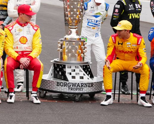 INDIANAPOLIS, IN - MAY 18: IndyCar, Indy Car, IRL, USA driver Josef Newgarden on left talks to driver Alex Palou on right before a group driver photo is taken before practice for the 110th Running of the Indianapolis 500 on May 18th, 2026, at the Indianapolis Motor Speedway in Indianapolis, Indiana. (Photo by Brian Spurlock Icon Sportswire) AUTO: MAY 18 NTT IndyCar Series Indianapolis 500 Practice EDITORIAL USE ONLY Icon26051850011