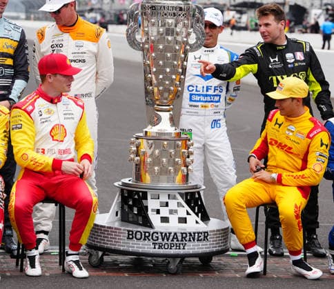 INDIANAPOLIS, IN - MAY 18: IndyCar, Indy Car, IRL, USA driver Josef Newgarden on left talks to driver Alex Palou on right before a group driver photo is taken before practice for the 110th Running of the Indianapolis 500 on May 18th, 2026, at the Indianapolis Motor Speedway in Indianapolis, Indiana. (Photo by Brian Spurlock Icon Sportswire) AUTO: MAY 18 NTT IndyCar Series Indianapolis 500 Practice EDITORIAL USE ONLY Icon26051850010