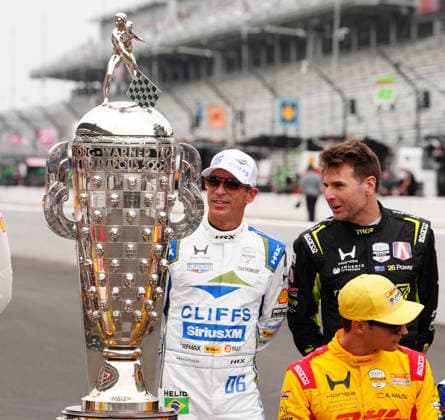 INDIANAPOLIS, IN - MAY 18: From left to right IndyCar, Indy Car, IRL, USA drivers Hello Castroneves and Will Power look at the Borg Warner Trophy before a group driver photo is taken before practice for the 110th Running of the Indianapolis 500 on May 18th, 2026, at the Indianapolis Motor Speedway in Indianapolis, Indiana. (Photo by Brian Spurlock Icon Sportswire) AUTO: MAY 18 NTT IndyCar Series Indianapolis 500 Practice EDITORIAL USE ONLY Icon26051850014