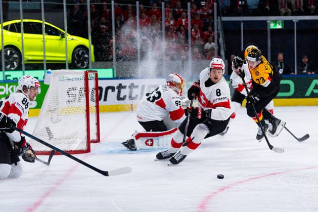 ZURICH, SWITZERLAND - MAY 18: Lukas Reichel (Germany, 73), Simon Knak (Switzerland, 8), Janis Moser (Switzerland, 86) and Leonardo Genoni (Switzerland, 63) during the Preliminary Round - Group A Match 19 between Germany and Switzerland at the IIHF Ice hockey, Eishockey World Championship, WM, Weltmeisterschaft 2026, Swiss Life Arena on May 18, 2026 in Zurich, Switzerland. Zurich Switzerland Copyright: xTimoxSteinx