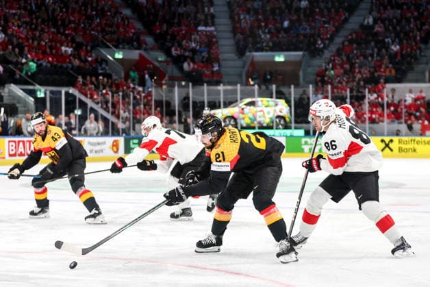 Ice hockey, Eishockey - IIHF WC 2026 ZURICH,SWITZERLAND,18.MAY.26 - ICE HOCKEY - IIHF Ice Hockey World Championship, WM, Weltmeisterschaft 2026, group stage, Germany vs Switzerland. Image shows Leon Huttl (GER) and Janis Moser (SUI).  GEPAxpictures xMaticxKlansek