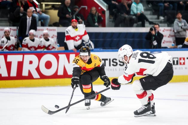 Ice hockey, Eishockey - IIHF WC 2026 ZURICH,SWITZERLAND,18.MAY.26 - ICE HOCKEY - IIHF Ice Hockey World Championship, WM, Weltmeisterschaft 2026, group stage, Germany vs Switzerland. Image shows Marc Michaelis (GER) and Sven Jung (SUI).  GEPAxpictures xMaticxKlansek