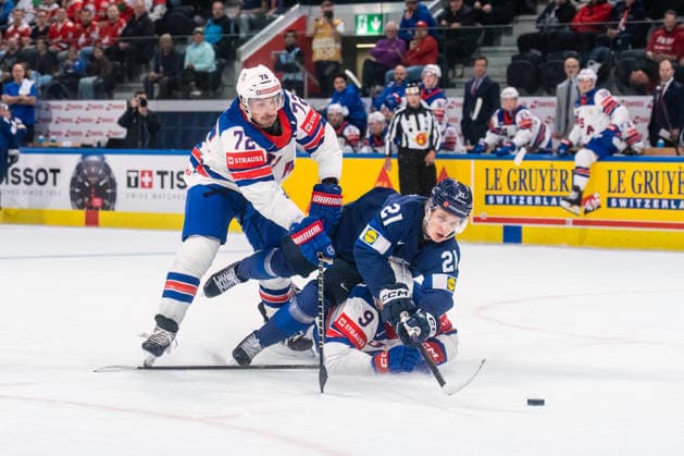 xxkeikkaxx 20260518 Swiss Life Arena, Zurich, Switzerland. IIHF Ice hockey, Eishockey World Championships match Finland vs USA Patrik Puistola (21) of Team Finland Ryan Leonard (9) of Team USA Justin Faulk (72) of Team USA Photo by Pasi Suokko All Over Press  1.06199731