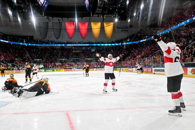 ZURICH, SWITZERLAND MAY 18 Sven Andrighetto of Switzerland L celebrates his goal with Denis Malgin of Switzerland R during the 2026 IIHF Ice Hockey World Championship Switzerland game between Germany and Switzerland at Swiss Life Arena on May 18, 2026 in Zurich, Zurich Zurich Swiss Life Arena Zurich Switzerland Copyright: xJustPictures.ch AndreaxBrancax jp-en-EuSpIm-JP7_ANB_Ger_Sui_18052026_5415
