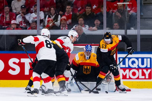 ZURICH, SWITZERLAND - MAY 18: Moritz Seider (Germany, 53) and Jonas Stettmer (Germany, 1) fighting against Simon Knak (Switzerland, 8) and Calvin Thuerkauf (Switzerland, 79) during the Preliminary Round - Group A Match 19 between Germany and Switzerland at the IIHF Ice hockey, Eishockey World Championship, WM, Weltmeisterschaft 2026, Swiss Life Arena on May 18, 2026 in Zurich, Switzerland. Zurich Switzerland Copyright: xTimoxSteinx
