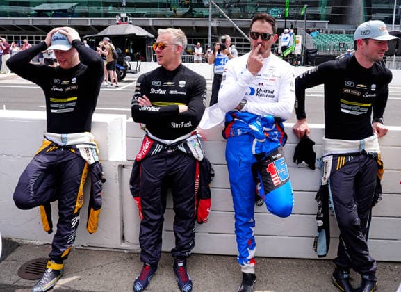 INDIANAPOLIS, IN - MAY 18: From left to right IndyCar, Indy Car, IRL, USA drivers Christian Rasmussen and Ed Carpenter and Graham Rahal and Alexander Rossi wait for a driver group photo to be taken before practice for the 110th Running of the Indianapolis 500 on May 18th, 2026, at the Indianapolis Motor Speedway in Indianapolis, Indiana. (Photo by Brian Spurlock Icon Sportswire) AUTO: MAY 18 NTT IndyCar Series Indianapolis 500 Practice EDITORIAL USE ONLY Icon26051850042