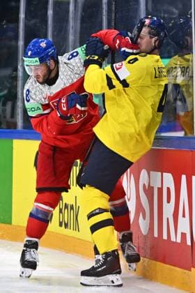From left Ondrej Beranek of Czech Republic and Jacob Larsson of Sweden in action during the IIHF World Championship, WM, Weltmeisterschaft Group B match Sweden vs Czech Republic on May 18, 2026, Fribourg, Switzerland. (CTKxPhoto RadekxPetrasek) CTKPhotoP2026051808580  CTKPhotoP2026051808580