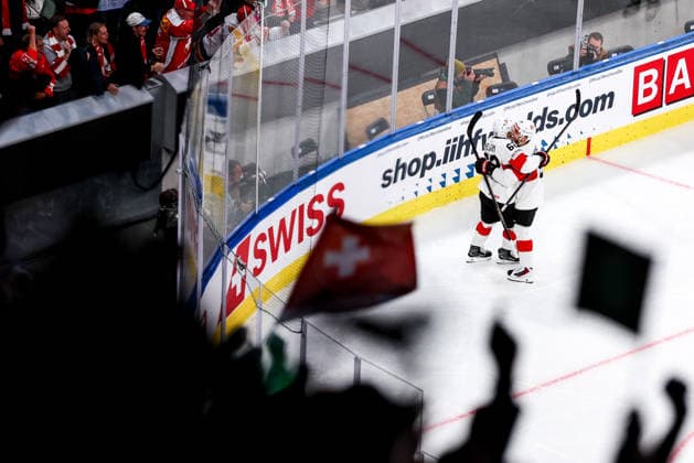Ice hockey, Eishockey - IIHF WC 2026 ZURICH,SWITZERLAND,18.MAY.26 - ICE HOCKEY - IIHF Ice Hockey World Championship, WM, Weltmeisterschaft 2026, group stage, Germany vs Switzerland. Image shows the rejoicing of Denis Malgin (SUI) and Sven Andrighetto (SUI). Keywords: flag.  GEPAxpictures xMaticxKlansek