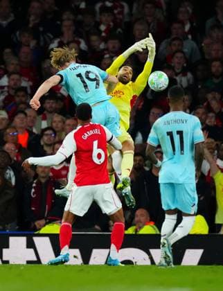 Zian Flemming of Burnley is booked for this challange on Arsenal Goalkeeper David Raya Arsenal v Burnley, Premier League, Football, Emirates Stadium, London, UK - 18 May 2026London Emirates Stadium United Kingdom EDITORIAL USE ONLY No use with unauthorised audio, video, data, fixture lists, club league logos or live services. Online in-match use limited to 120 images, no video emulation. No use in betting, games or single club league player publications.  Copyright: xJavierxGarcia Shutterstockx 16881286ae