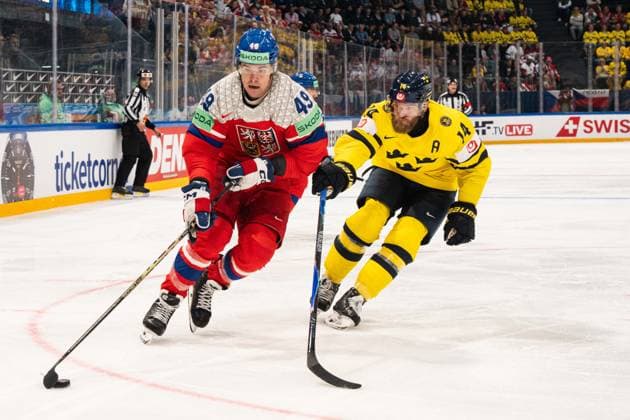 FRIBOURG, FRIBOURG - MAY 18: Jaroslav Chmelar of Czechia battles with Mattias Ekholm of Sweden during the 2026 IIHF World Championship, WM, Weltmeisterschaft Preliminary Round Group B match between Sweden and Czechia at BCF Arena on May 18, 2026 in Fribourg, Fribourg, Switzerland. Copyright: xLivioxBaeriswylx xSPPx Sportspressphoto_SPR149753