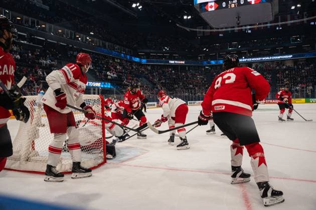 FRIBOURG, FRIBOURG - MAY 18: A dangerous scoring chance in front of goal during the 2026 IIHF World Championship, WM, Weltmeisterschaft Preliminary Round Group B match between Canada and Denmark at BCF Arena on May 18, 2026 in Fribourg, Fribourg, Switzerland. Copyright: xLivioxBaeriswylx xSPPx Sportspressphoto_SPR149921